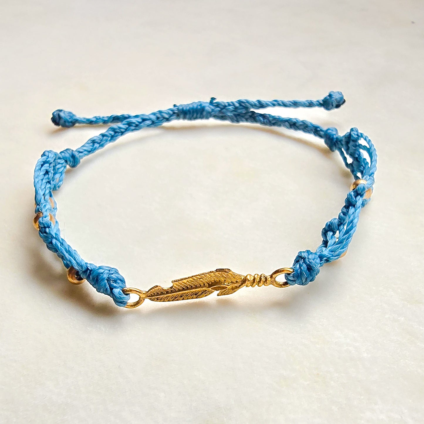 Feather brass bracelet